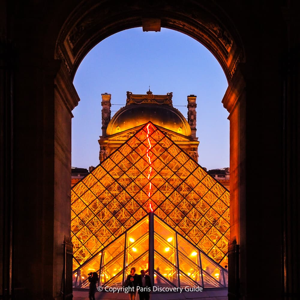 The Louvre and Pyramid at night from the Richelieu Passage