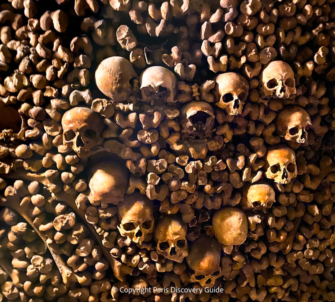 Arrangement of skulls and bones at the Paris Catacombs