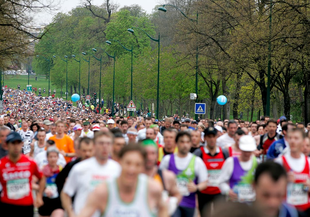 Paris Marathon runners pass through Bois de Vincennes 