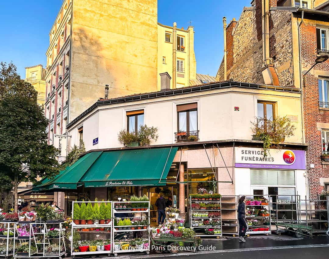 Outdoor seating at Cafe La Factorie Saint Amour next to Pere Lachaise Cemetery in early March