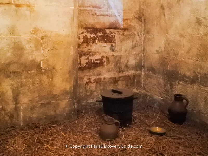 Conciergerie cell with straw floor where the poorest prisoners stayed